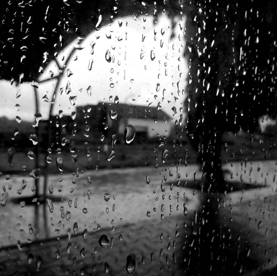 Looking through the train window glass when the rain stops