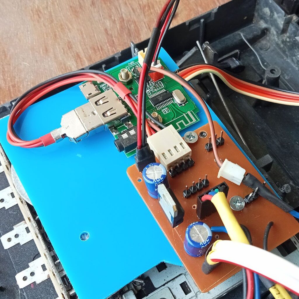 MP3 module and power supply board mounted behind the cassette mechanism