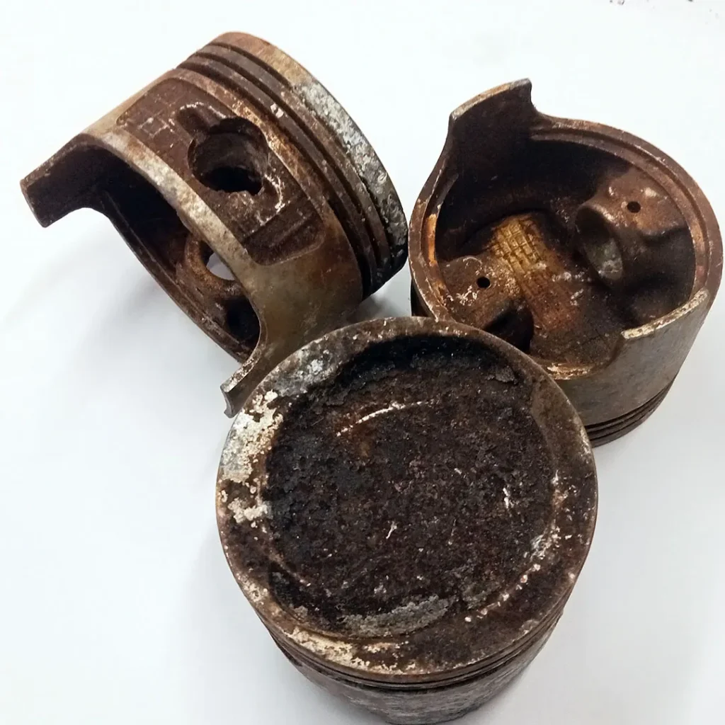 Discarded piston that is no longer functional and used for A rugged Bluetooth speaker.