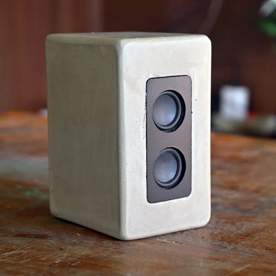 Bluetooth speaker with cement enclosure