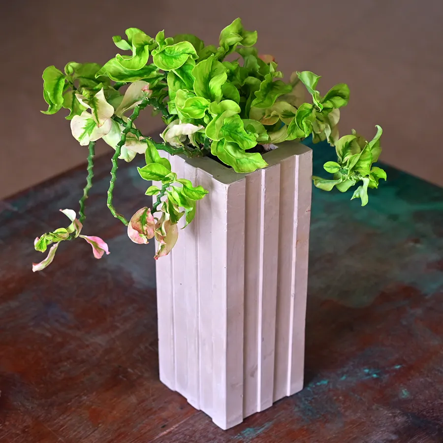 Tall cement flower pot